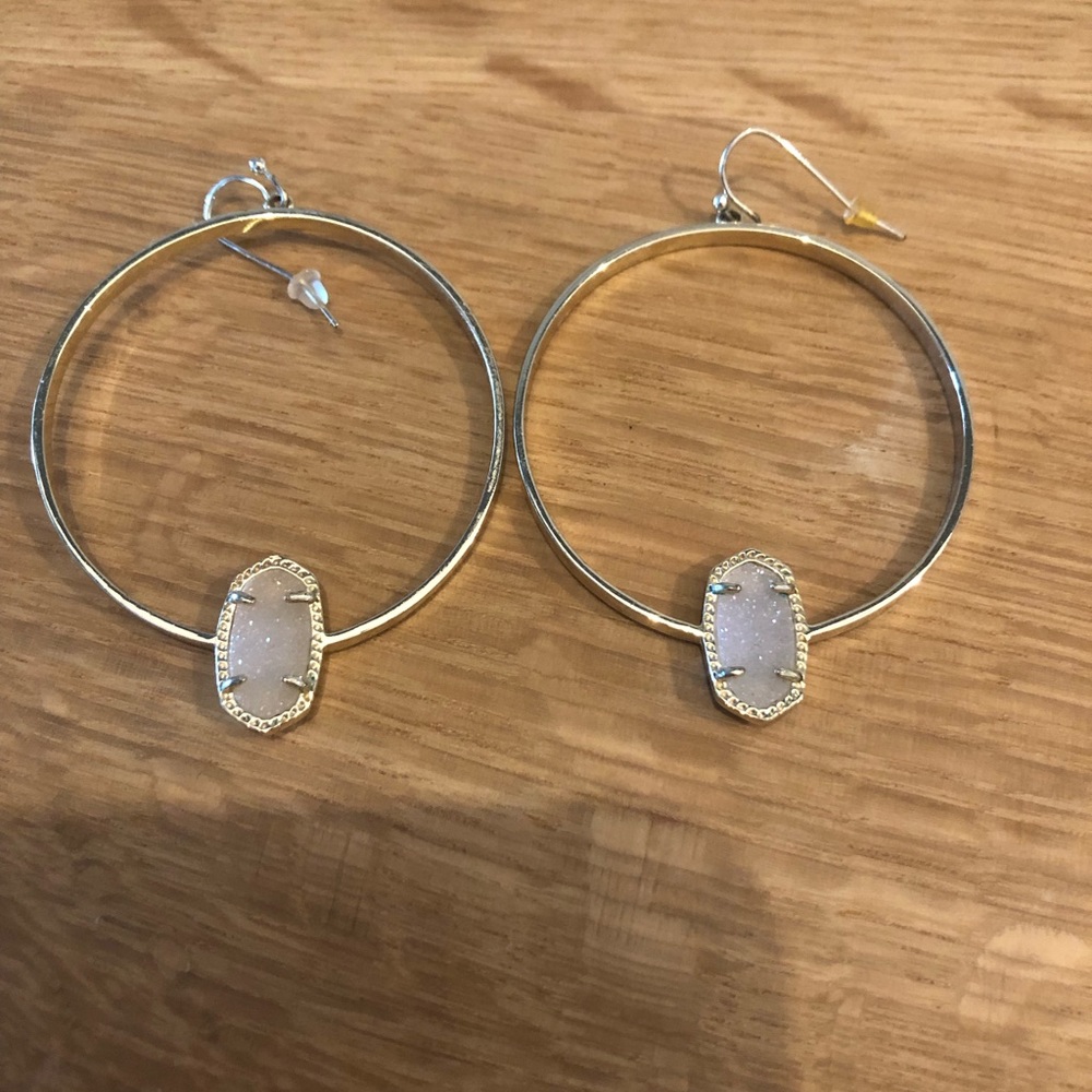 Opaque stone with gold hardware hoops